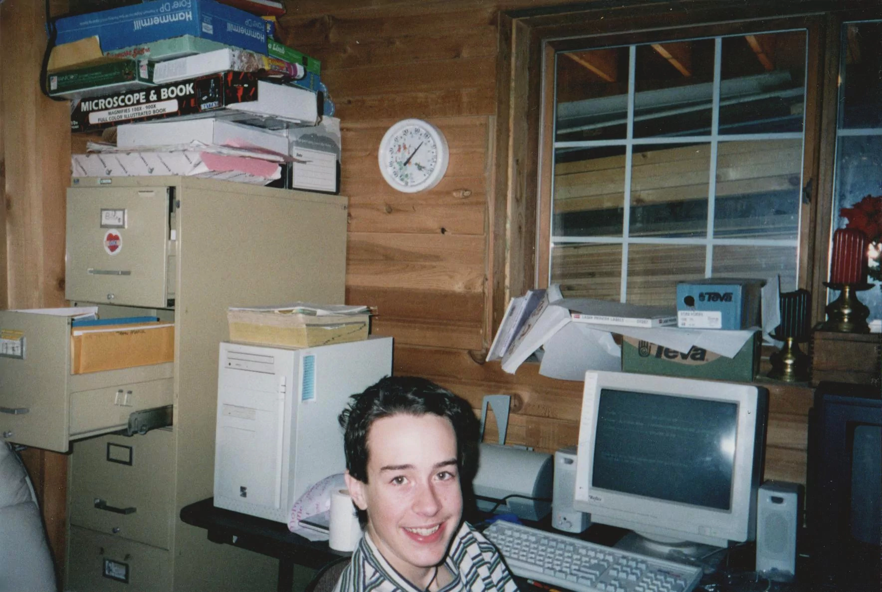 Your humble narrator sitting at the family's PC in an unfinished basement in Woodland Park, CO